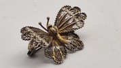 Filigran broche af 830 sølv