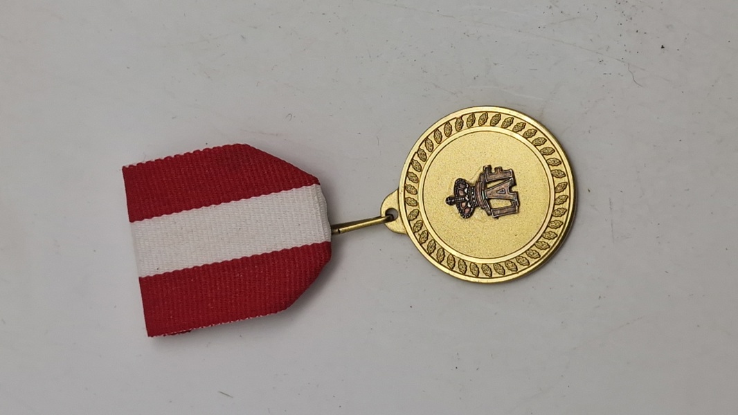50 års medalje fra LAF. Original