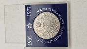 Britisk 25-pence "Crown"-mønt fra 1977, der fejrer Dronning Elizabeth II's 25-års jubilæum (Silver Jubilee). 
