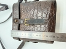 A MULBERRY BROWN CROCODILE LEATHER HAND BAG, binocular style, original 