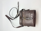 A MULBERRY BROWN CROCODILE LEATHER HAND BAG, binocular style, original 