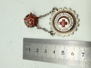 Russisk emblem kendt som "Klar til sanitært forsvar af USSR" (ГСО - Gotov k sanitarnoy oborone SSSR), som blev tildelt mellem 1934 og 1941