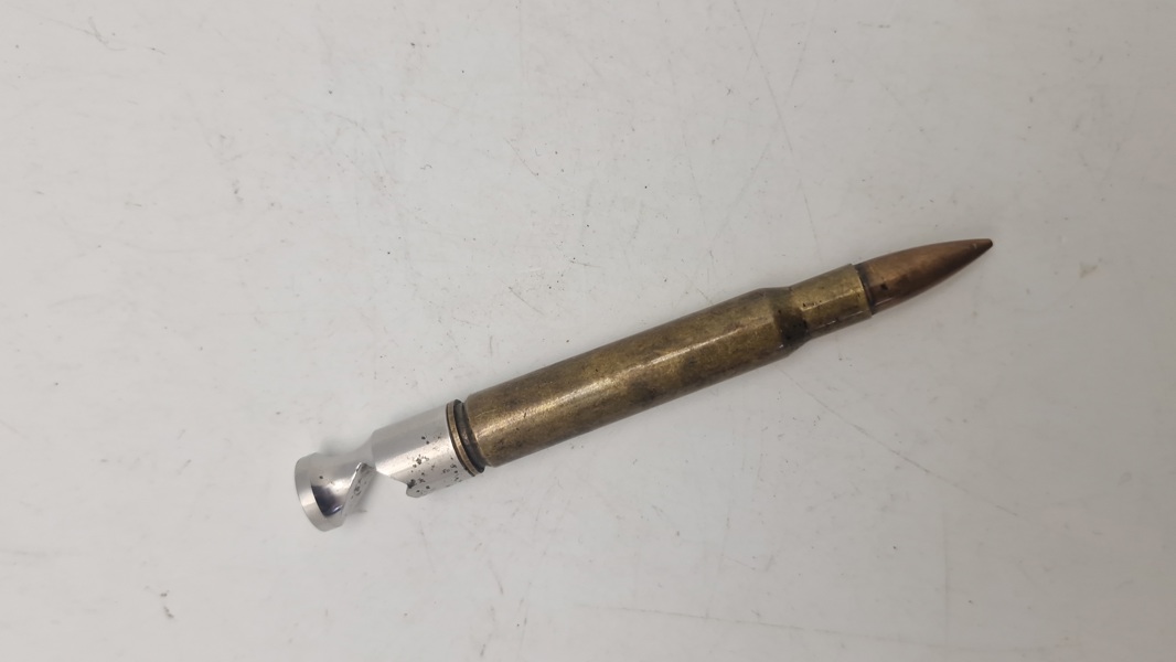 Navngivet krus lavet af 40 mm hylster fra  Nørrejyske Artilleriregiment