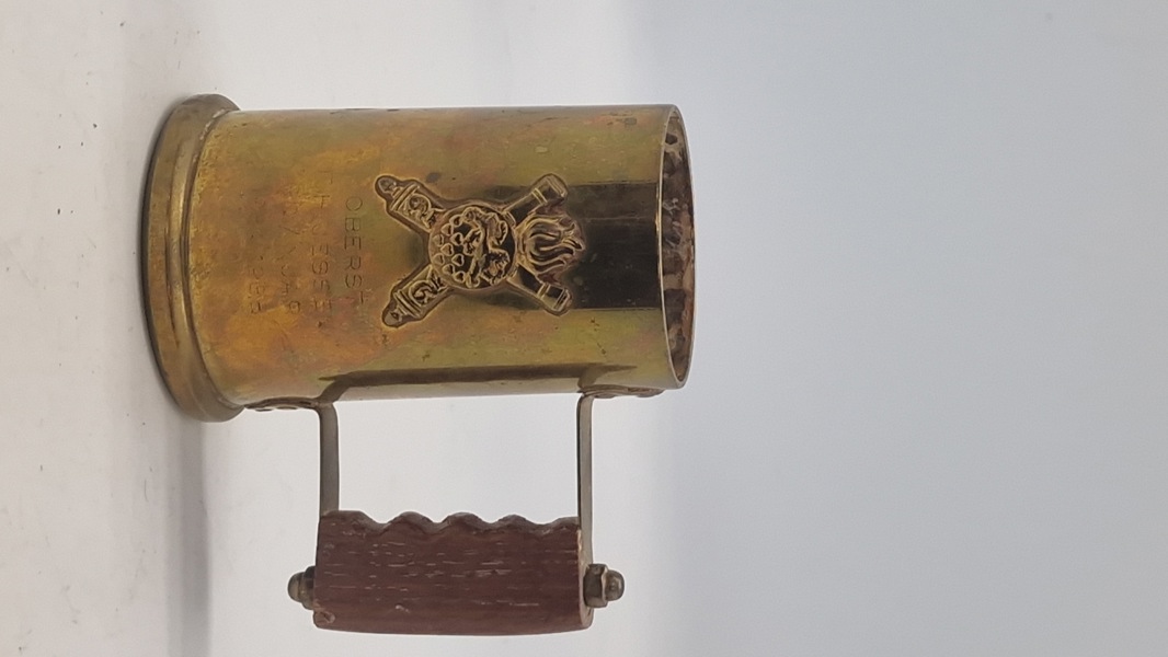 Navngivet krus lavet af 40 mm hylster fra  Nørrejyske Artilleriregiment