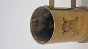 Navngivet krus lavet af 40 mm hylster fra  Nørrejyske Artilleriregiment