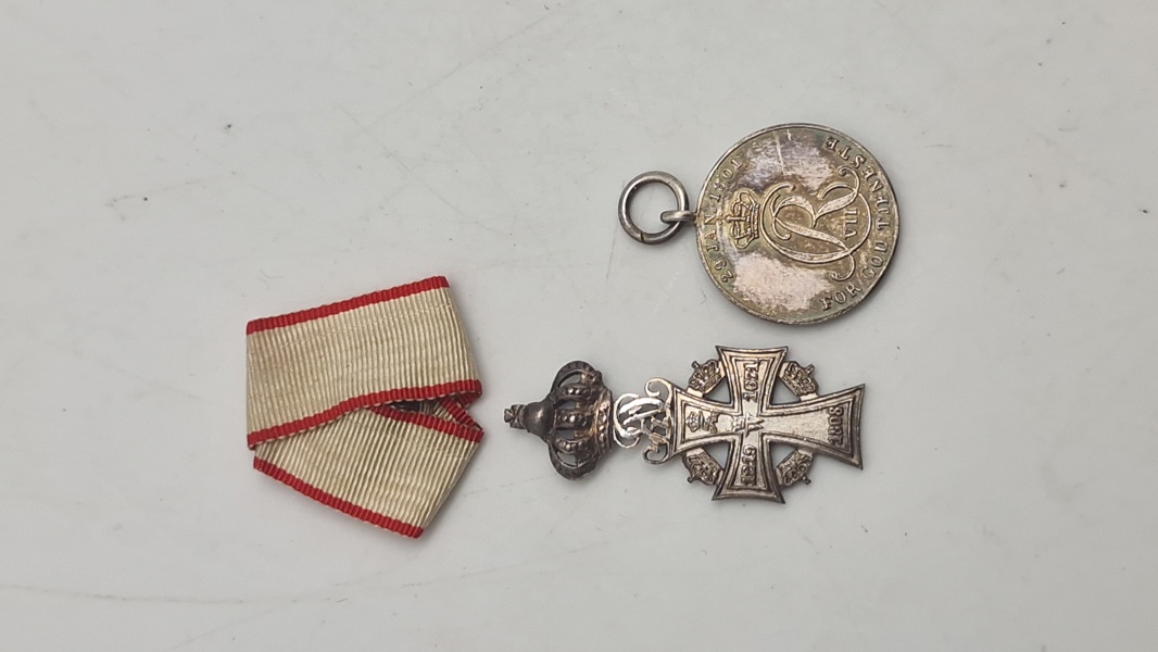 Miniture medaljer med mangler 