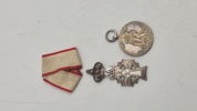 Miniture medaljer med mangler 