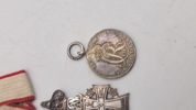 Miniture medaljer med mangler 